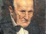 portrait of an old man in a tuxedo and bow tie