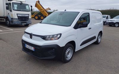 a picture of a white van parked in a parking lot