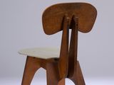 an image of a wooden chair with a seat and back rest