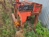 a machine that is sitting on the side of a building