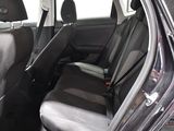 the back seats of a car are black and grey in color