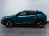 a blue suv parked in a room with a white wall