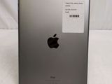 the back of an apple ipad with a sticker on it