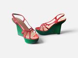 red and green wedged sandals on a white background