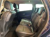 the back seats of a car are empty and the passenger seat is empty