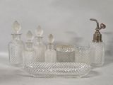 a lot of glass items that are sitting on a table