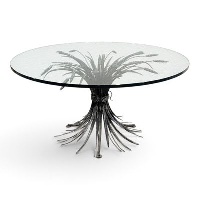 an image of a glass table with a metal base and a glass top