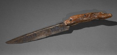 a knife that is sitting on a table