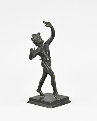 an image of a statue of a man holding a basketball ball