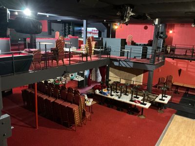 an image of a large room with a lot of chairs and tables