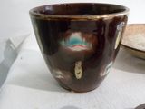 a bowl and a plate sitting on a table