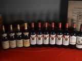 several bottles of wine are lined up on a table