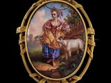 une image représentant un tableau où l'on voit une femme avec une chèvre dans un champ