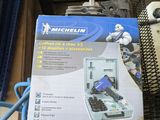 a box that has a blue hose attached to it