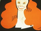 a book with a picture of a woman with long red hair