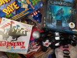 a pile of toys and games on the floor