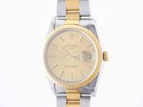 rolex lady ' s watch with two tone gold dial and bracelet