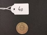 a close up of a coin with a price tag attached to it
