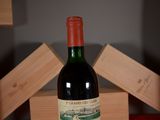 a bottle of wine that is sitting on a table