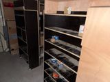 a closet with a lot of shelves in it
