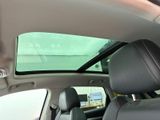 a view of the sunroof from inside of a car