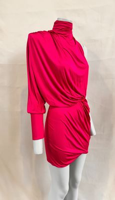 the mannequin is wearing a bright pink dress with a cow neck