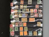 a black book with a bunch of stamps on it