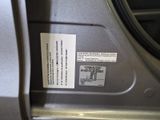 a label on the door of a washing machine