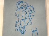une image représentant un livre sur lequel figure le dessin d'une femme