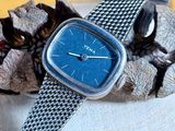 a watch that is sitting on top of a table