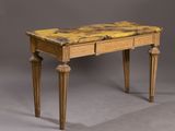 a small wooden table with a yellow top and legs