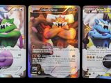 three pokemon cards with different colors and designs on them