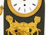 a clock that is sitting on top of a table