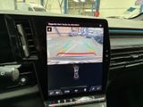 a picture of a car ' s dashboard with a camera mounted on it
