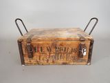 an old wooden box with metal handles and handles on a gray surface