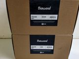 two boxes are stacked on top of each other on a table