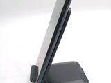 a close up of a cell phone on a stand