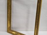 a gold frame with a white background and a white background