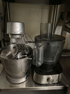 a blender and a mixer on a counter in a kitchen