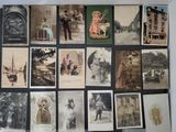 a lot of old photos of people on the wall