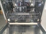 a dishwasher that is sitting inside of a dishwasher