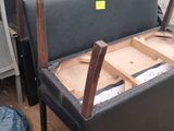 a bed that is sitting on a wooden floor