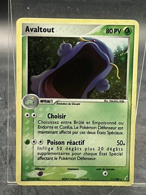a close up of a pokemon card on a table