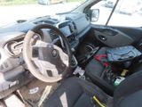 dashboard of a car with a bunch of items in the front seat