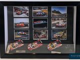 a picture of a picture of a race car in a display case