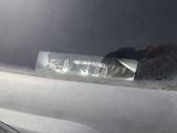 a car door handle with a sticker on it
