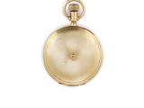 an antique gold pocket watch with a chain hanging from it ' s side