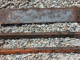 two pieces of rust on the ground next to each other