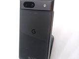 a close up of a cell phone on a stand