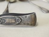 a close up of a spoon and a spoon rest on a table